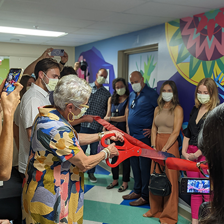 Ribbon cutting ceremony for our new family room