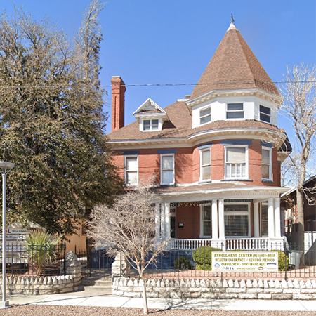 A house with a pointed roof, our original house